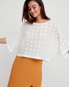 white flowered designed top